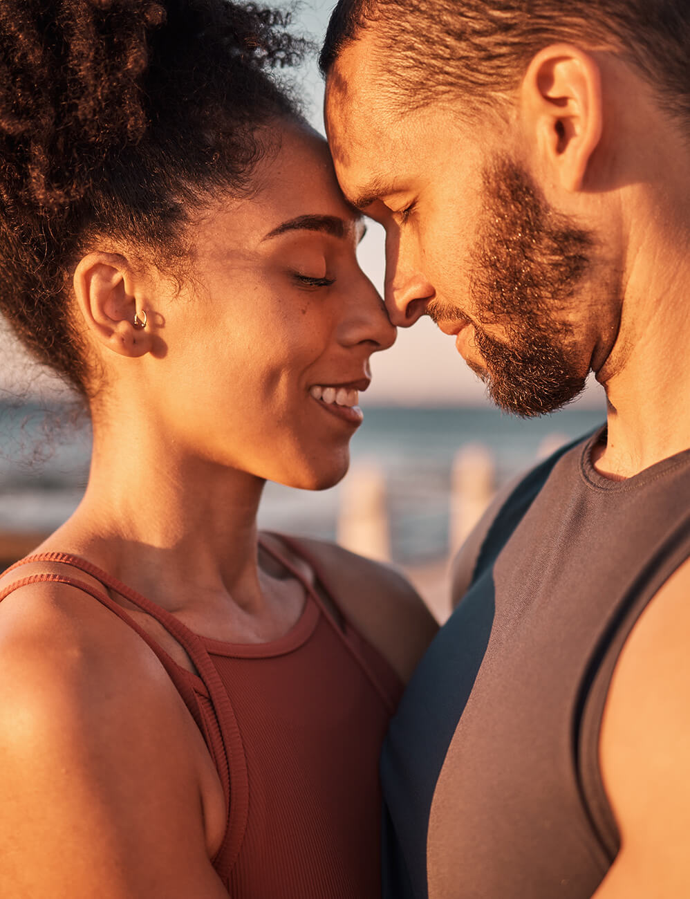 black-couple-smile-and-hug-with-forehead-by-beach-2026-01-09-10-54-05-utc (1)